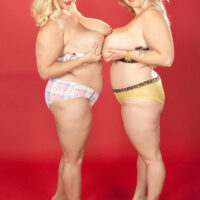 Plus-sized light-haired lesbians Renee Ross and Samantha 38G smooch after going sans melon-holder
